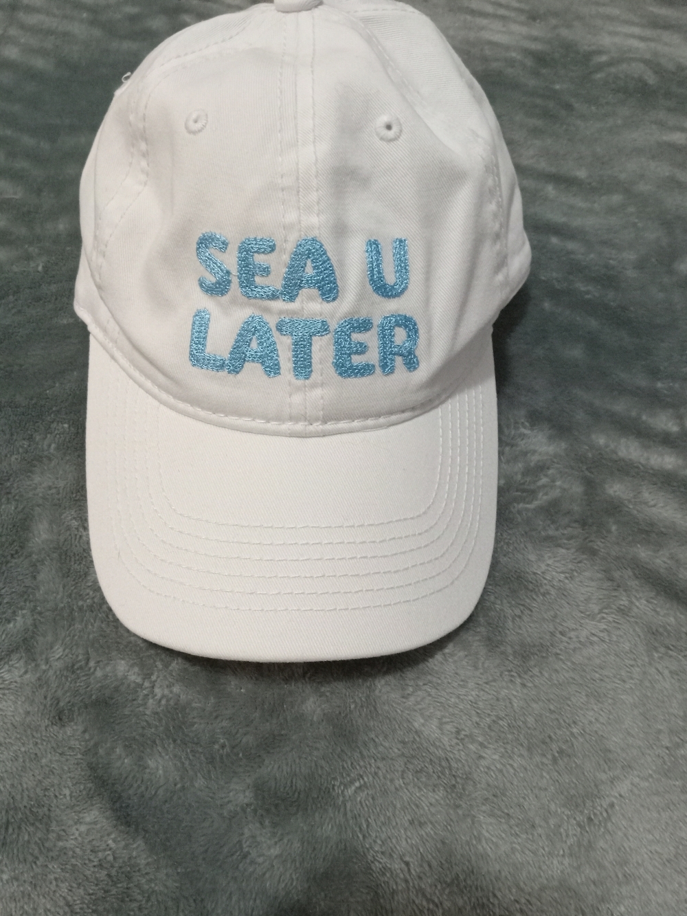 Sea U Later Baseball Type Hat White With Blue Letters Adjustable Buckle Back